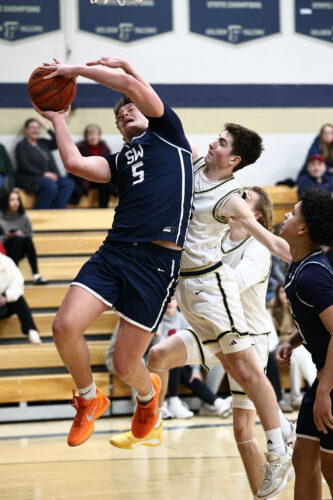 Trojans Come Out Hot, Beat Falconer